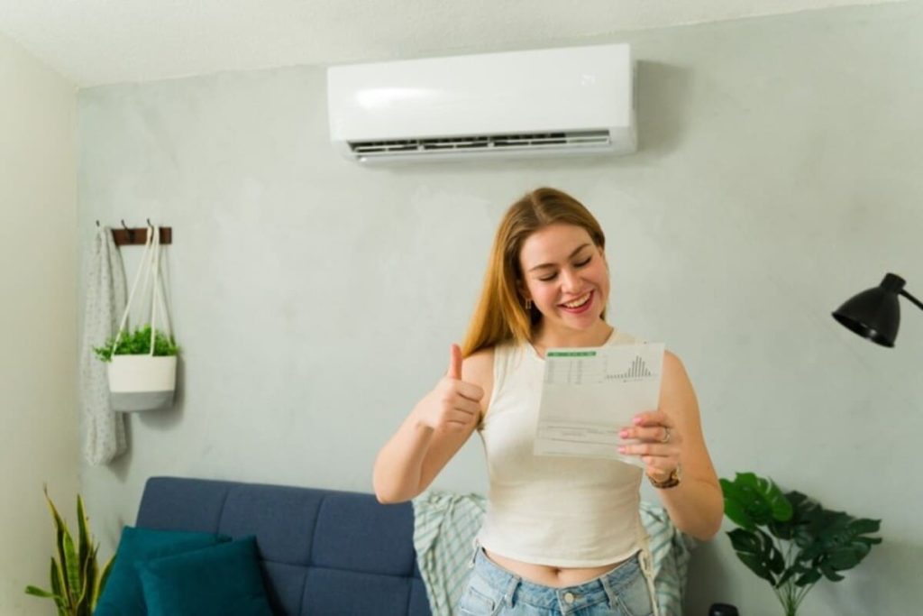 A woman pleased with the energy efficiency of her new apartment – Green Lake